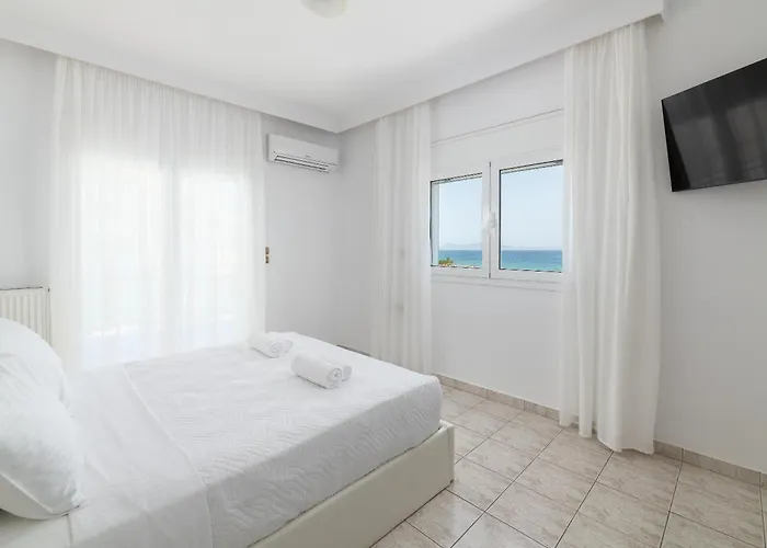 White & Blue Beachfront Luxury Villa *